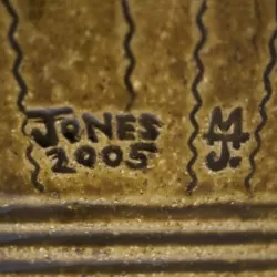 Image of Mark and Signature Jones 2005 MJ on undefined, on the - None -, Inscribed, in the shape of a Rectangle with the letters e, j, n, o, s, 