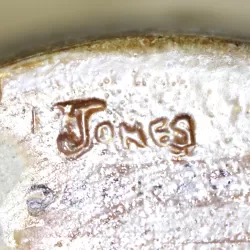 Image of Signature jones on undefined, on the Foot, Inscribed, in the shape of a Rectangle with the letters e, j, n, o, s, 